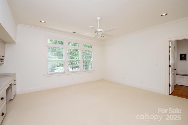 3408 Sandalwood Ln, Waxhaw, NC 28173 - unfurnished living room with crown molding, a ceiling fan, light carpet, and recessed lighting