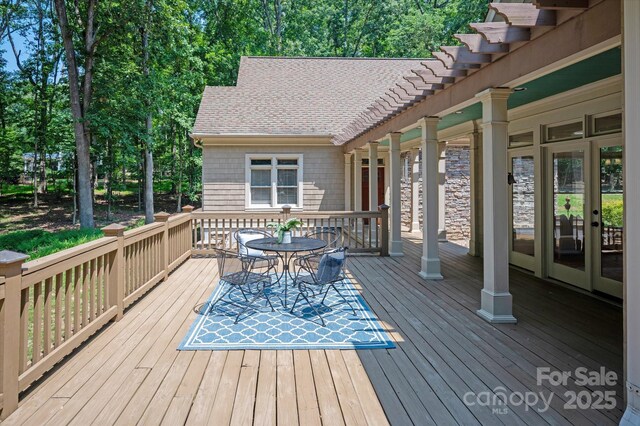 3408 Sandalwood Ln, Waxhaw, NC 28173 - wooden terrace with outdoor dining area and view of scattered trees