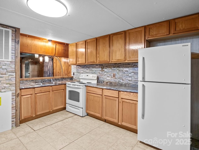 70 John Delk Rd, Hendersonville, NC 28792 - kitchen featuring white appliances, backsplash, dark countertops, and light tile patterned floors