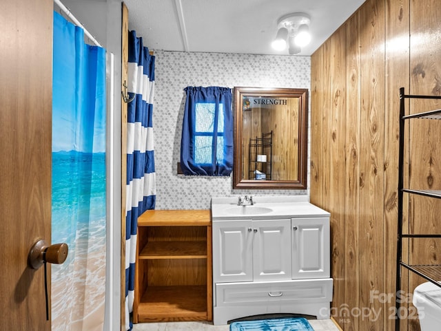 70 John Delk Rd, Hendersonville, NC 28792 - bathroom with wallpapered walls and vanity
