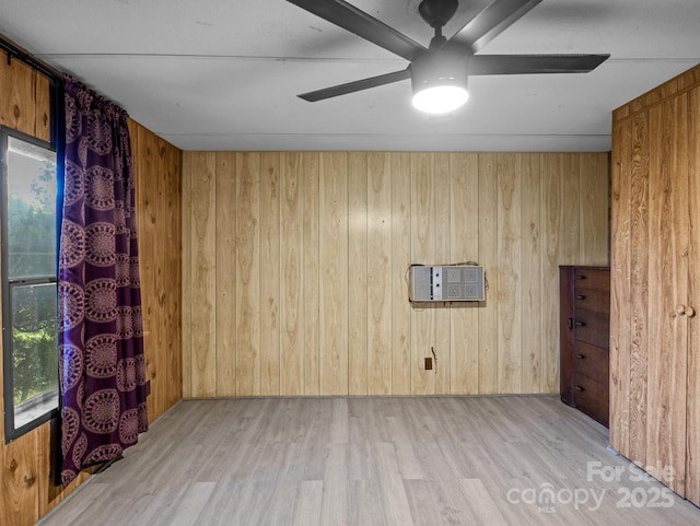 70 John Delk Rd, Hendersonville, NC 28792 - unfurnished room with wood finished floors, wooden walls, and a ceiling fan