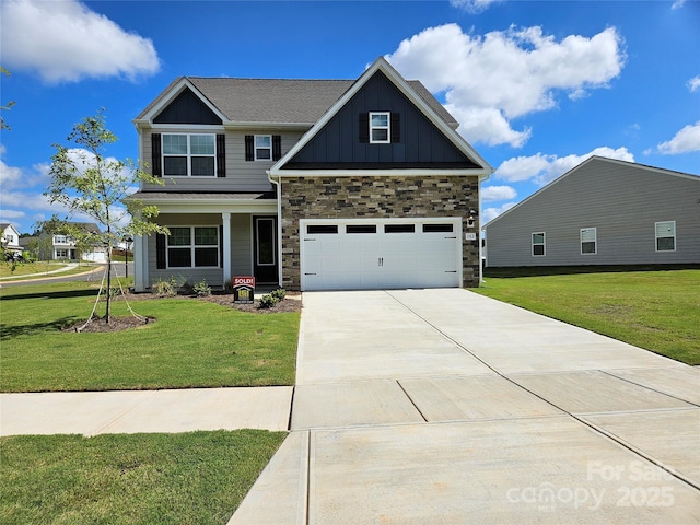 116 Kennford Trl, Troutman, NC 28166 - craftsman-style home with board and batten siding, a front yard, driveway, and stone siding