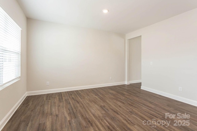 116 Kennford Trl, Troutman, NC 28166 - unfurnished room with dark wood-type flooring and recessed lighting