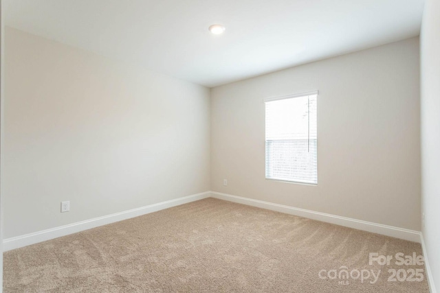 116 Kennford Trl, Troutman, NC 28166 - empty room featuring light colored carpet and baseboards