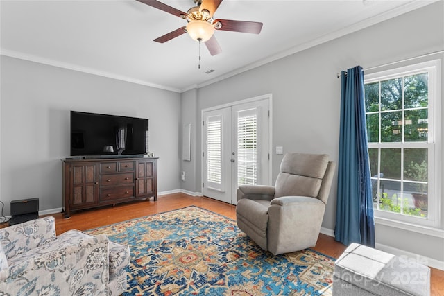 4103 Christine Ln Unit E, Waxhaw, NC 28173 - living room with crown molding, wood finished floors, and a ceiling fan