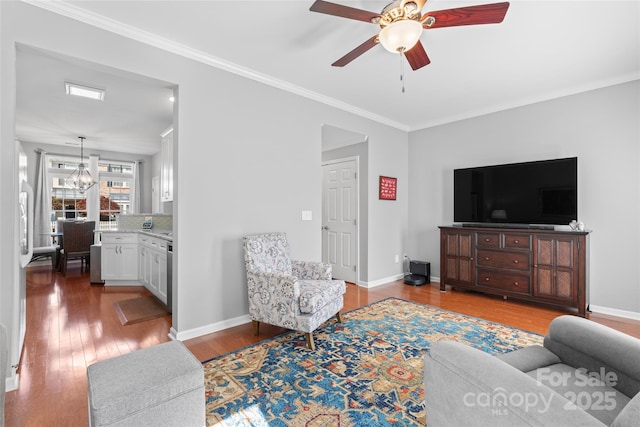 4103 Christine Ln Unit E, Waxhaw, NC 28173 - living area featuring ceiling fan, wood finished floors, ornamental molding, and a chandelier