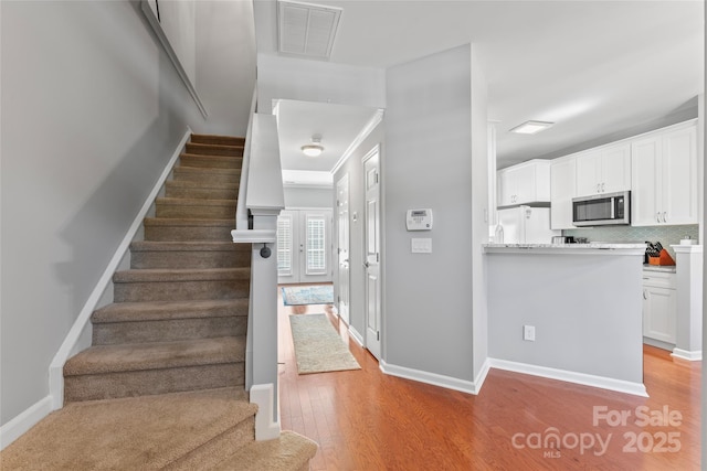 4103 Christine Ln Unit E, Waxhaw, NC 28173 - stairs featuring wood finished floors and baseboards
