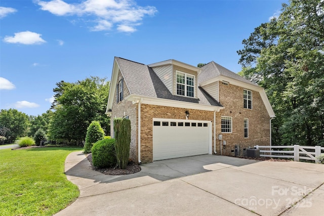 2074 Brandt Rd, York, SC 29745 - view of side of home featuring concrete driveway, brick siding, and roof with shingles