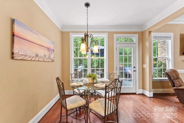 2074 Brandt Rd, York, SC 29745 - dining room with a chandelier, crown molding, and wood finished floors