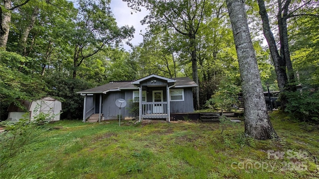 242 Upper Whitewater Rd, Sapphire, NC 28774 - bungalow-style house featuring a storage unit