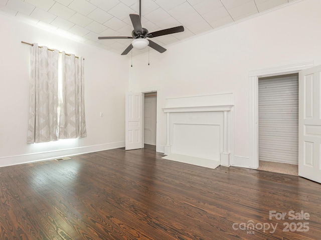 110 College St, Marshville, NC 28103 - unfurnished living room featuring a ceiling fan and wood finished floors