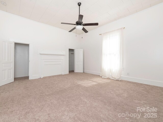 110 College St, Marshville, NC 28103 - unfurnished bedroom with carpet flooring and ceiling fan