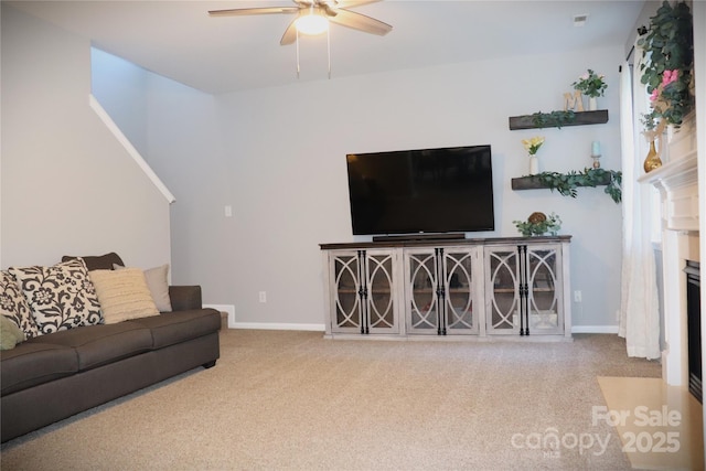 3092 S Legacy Park Blvd, Fort Mill, SC 29707 - living room with ceiling fan, carpet floors, and a fireplace with flush hearth