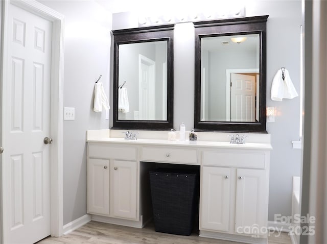 3092 S Legacy Park Blvd, Fort Mill, SC 29707 - full bathroom with double vanity and wood finished floors