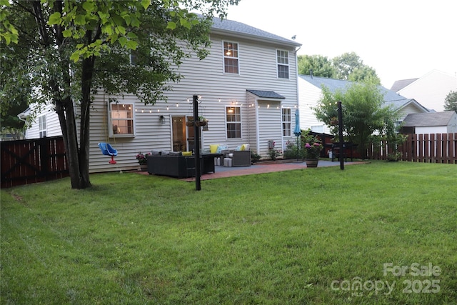 3092 S Legacy Park Blvd, Fort Mill, SC 29707 - rear view of house featuring a fenced backyard, outdoor lounge area, and a patio area