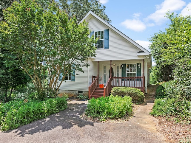 44 5th Ave, Asheville, NC 28806 - view of front facade featuring covered porch and crawl space