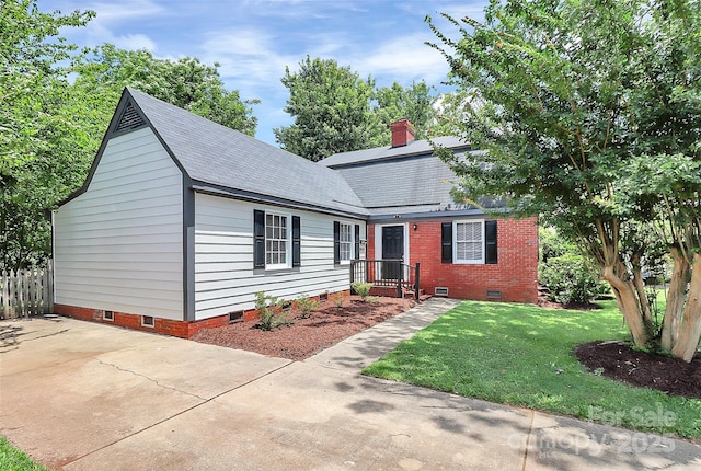3909 Woodbriar Trl, Charlotte, NC 28205 - view of front of property with crawl space, a shingled roof, and a chimney