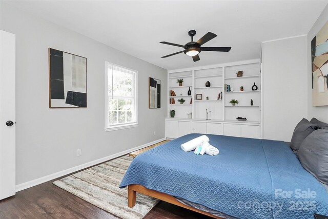 3909 Woodbriar Trl, Charlotte, NC 28205 - bedroom with wood finished floors and a ceiling fan