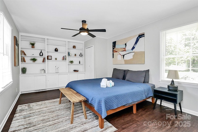 3909 Woodbriar Trl, Charlotte, NC 28205 - bedroom with dark wood-style floors, ceiling fan, and a closet