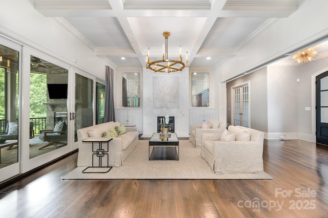 15603 June Washam Rd, Davidson, NC 28036 - living room featuring a fireplace, coffered ceiling, a chandelier, wood finished floors, and beam ceiling