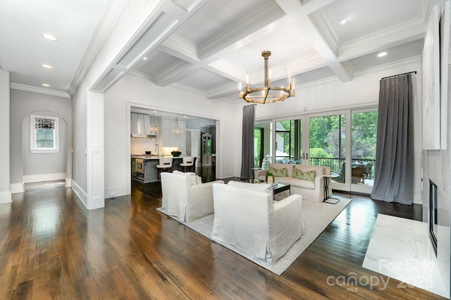 15603 June Washam Rd, Davidson, NC 28036 - living area featuring plenty of natural light, a chandelier, crown molding, beamed ceiling, and dark wood-style floors
