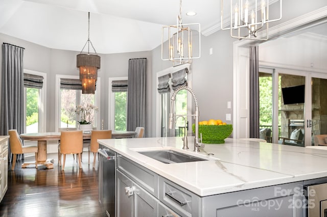 15603 June Washam Rd, Davidson, NC 28036 - kitchen featuring a chandelier, an island with sink, dark wood-style floors, gray cabinets, and plenty of natural light