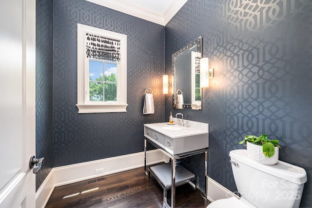 15603 June Washam Rd, Davidson, NC 28036 - bathroom with ornamental molding, wood finished floors, wallpapered walls, and vanity
