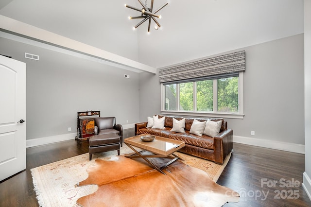 15603 June Washam Rd, Davidson, NC 28036 - living room featuring a chandelier, high vaulted ceiling, and wood finished floors