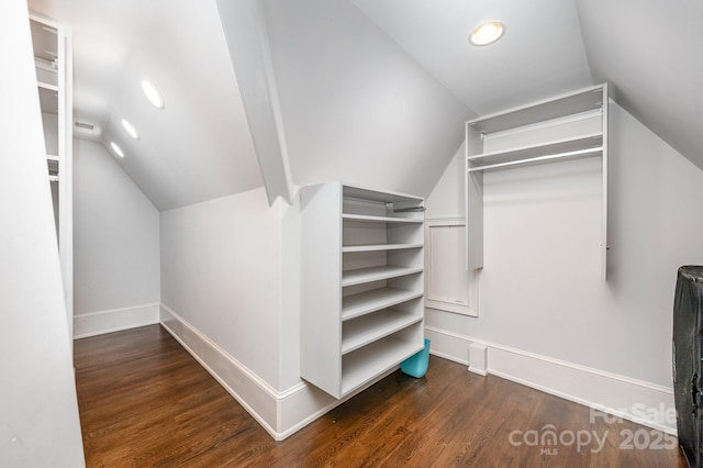 15603 June Washam Rd, Davidson, NC 28036 - walk in closet with vaulted ceiling and wood finished floors