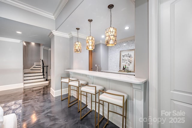 15603 June Washam Rd, Davidson, NC 28036 - bar featuring crown molding, stairs, recessed lighting, hanging light fixtures, and concrete flooring
