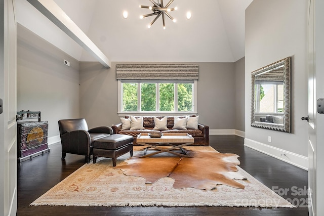 15603 June Washam Rd, Davidson, NC 28036 - living room with plenty of natural light, high vaulted ceiling, dark wood-style flooring, and a chandelier