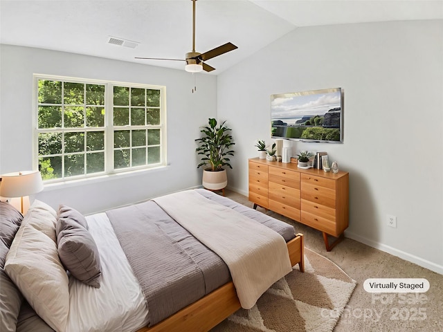 5163 Ficus Tree Ln, Charlotte, NC 28215 - carpeted bedroom featuring vaulted ceiling and ceiling fan