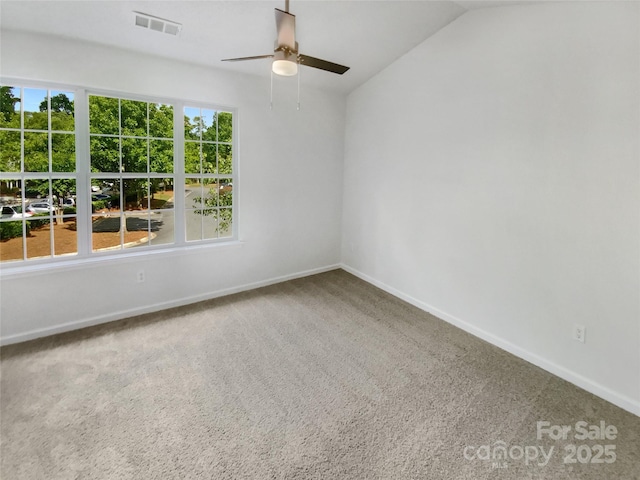5163 Ficus Tree Ln, Charlotte, NC 28215 - empty room featuring ceiling fan, carpet, and vaulted ceiling