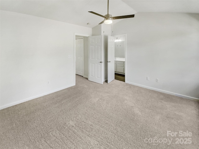 5163 Ficus Tree Ln, Charlotte, NC 28215 - unfurnished bedroom featuring carpet flooring, ensuite bath, ceiling fan, and high vaulted ceiling