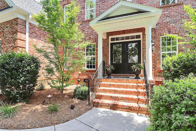 13824 Glen Abbey Dr, Charlotte, NC 28278 - entrance to property featuring french doors and brick siding