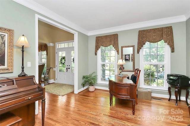 13824 Glen Abbey Dr, Charlotte, NC 28278 - sitting room featuring light wood-type flooring, crown molding, and healthy amount of natural light