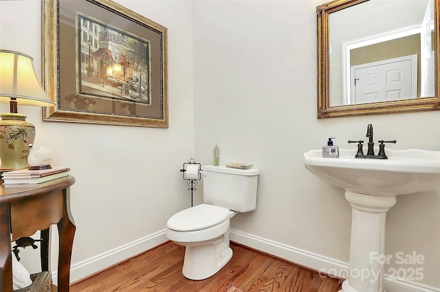 13824 Glen Abbey Dr, Charlotte, NC 28278 - bathroom featuring baseboards and wood finished floors