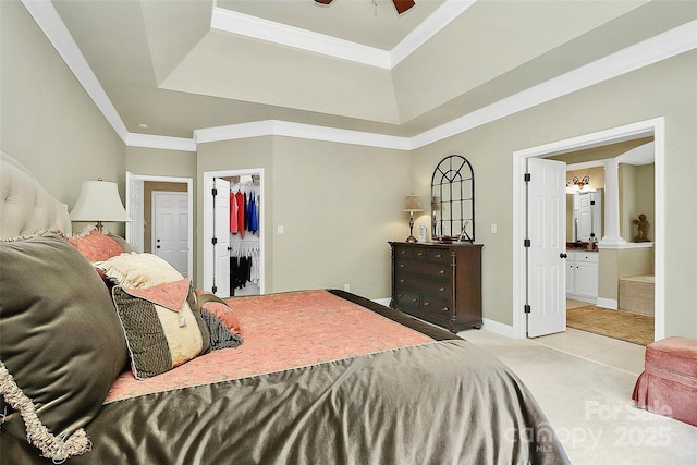 13824 Glen Abbey Dr, Charlotte, NC 28278 - bedroom featuring a raised ceiling, crown molding, ensuite bathroom, light tile patterned flooring, and light colored carpet