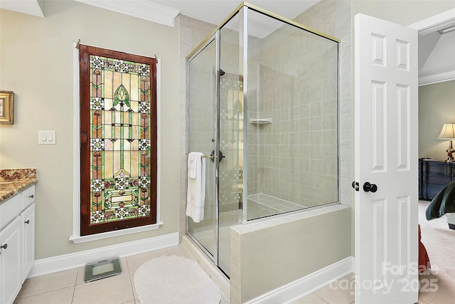 13824 Glen Abbey Dr, Charlotte, NC 28278 - bathroom with vanity, a stall shower, crown molding, and tile patterned floors