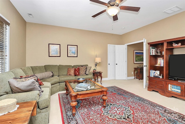 13824 Glen Abbey Dr, Charlotte, NC 28278 - living room with a ceiling fan and light colored carpet