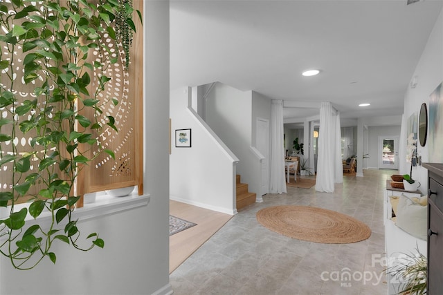 2926 Royal Fern Ln, Charlotte, NC 28215 - entrance foyer featuring stairway and recessed lighting