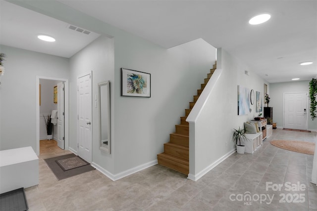 2926 Royal Fern Ln, Charlotte, NC 28215 - hallway with stairway, light tile patterned floors, and recessed lighting