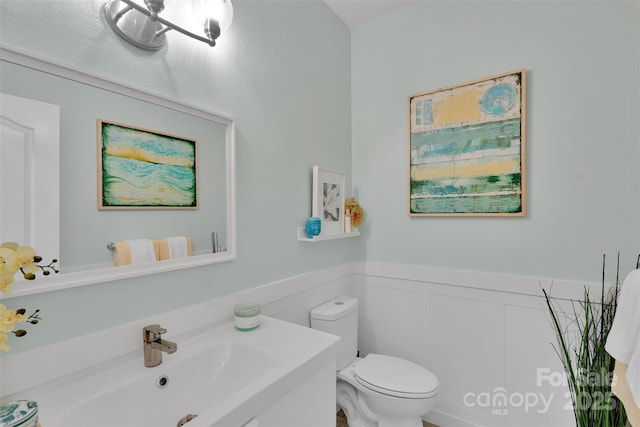 2926 Royal Fern Ln, Charlotte, NC 28215 - bathroom with a wainscoted wall and vanity