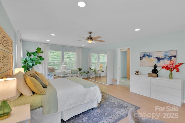 2926 Royal Fern Ln, Charlotte, NC 28215 - bedroom featuring light wood-type flooring, recessed lighting, and ceiling fan