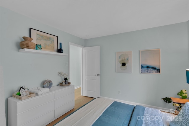 2926 Royal Fern Ln, Charlotte, NC 28215 - bedroom featuring light wood-type flooring and baseboards