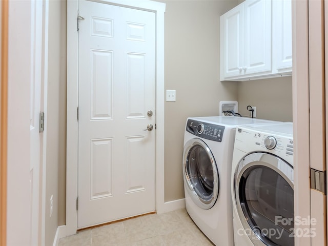 29 Kaylor Dr, Arden, NC 28704 - laundry area with washing machine and clothes dryer, light tile patterned floors, and cabinet space