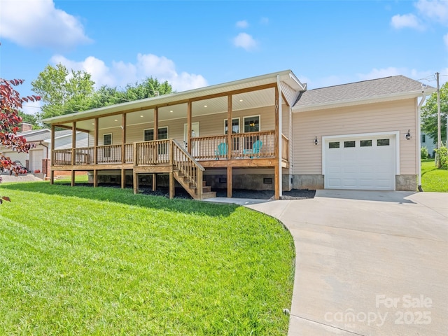 101 Meadowbrook Dr, Franklin, NC 28734 - back of property with covered porch, a garage, a lawn, and driveway
