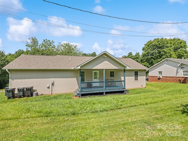 101 Meadowbrook Dr, Franklin, NC 28734 - back of property featuring a lawn, roof with shingles, and a porch