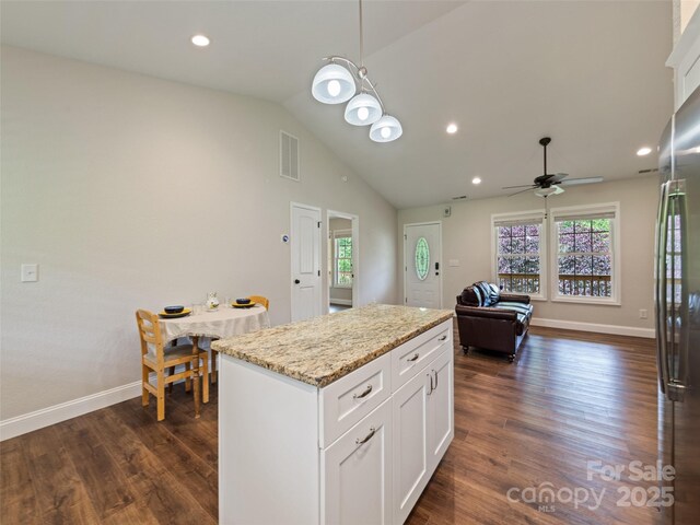 101 Meadowbrook Dr, Franklin, NC 28734 - kitchen with a center island, dark wood finished floors, a ceiling fan, white cabinets, and recessed lighting