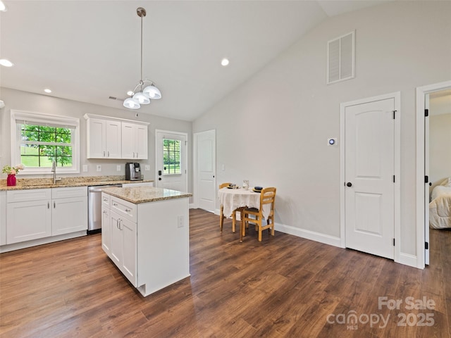 101 Meadowbrook Dr, Franklin, NC 28734 - kitchen featuring dishwasher, plenty of natural light, white cabinetry, a kitchen island, and recessed lighting
